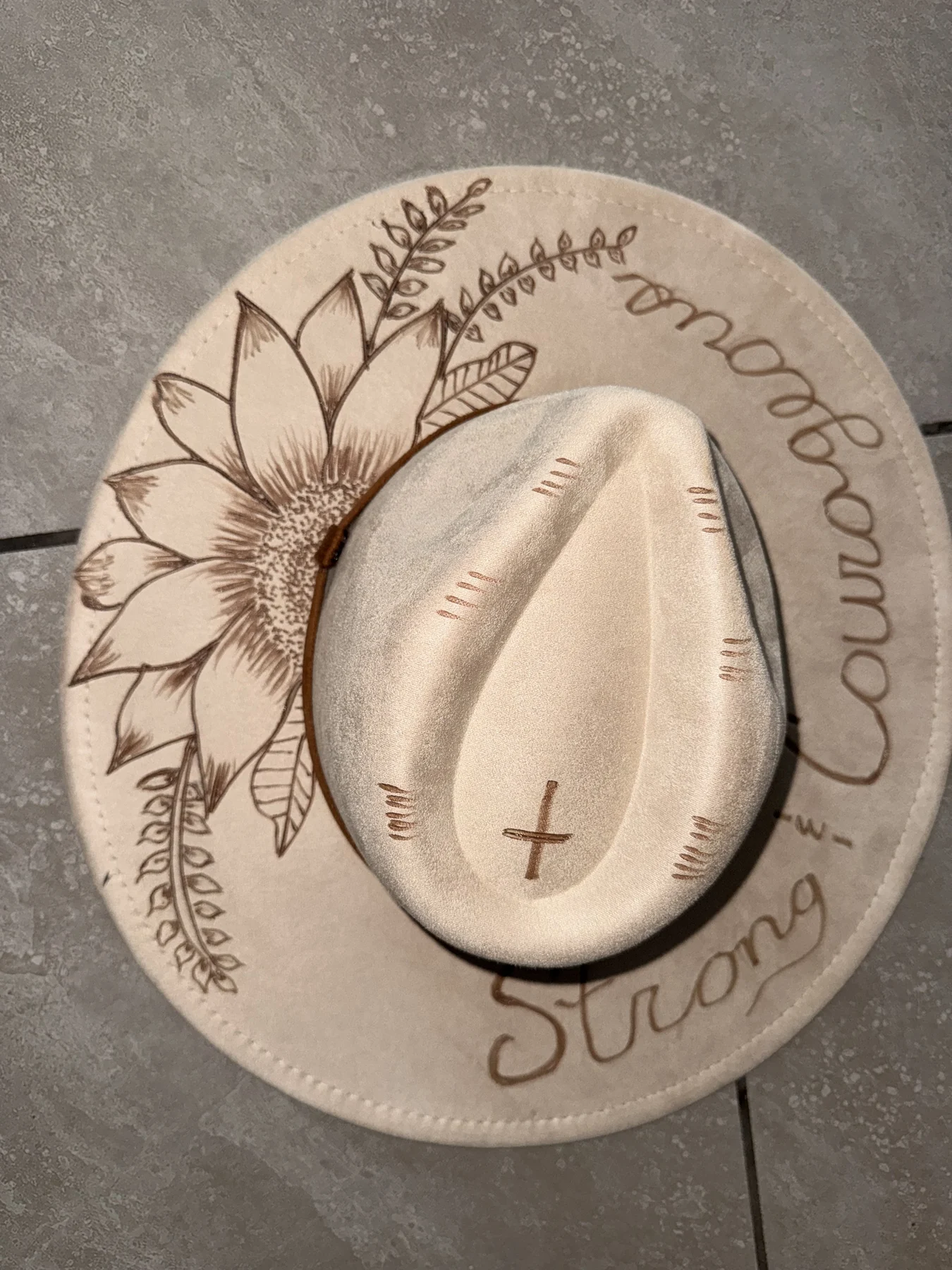 Ivory wide-brim hat with Strong and Courageous faith etching